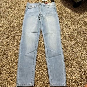 celebrity pink skinny mid-ride jeans